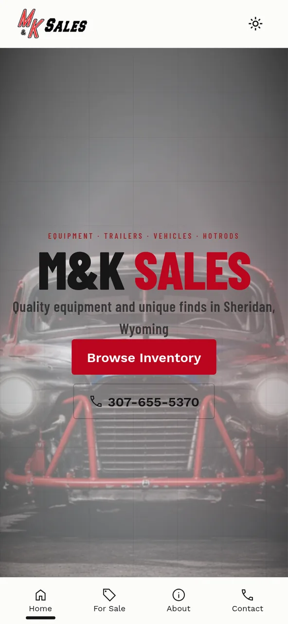 The M&K Sales site on a phone
